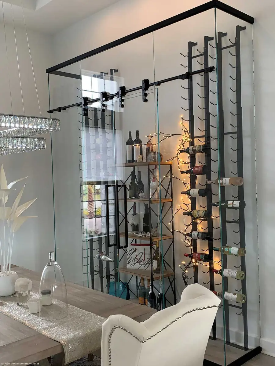 Glass wine wall with black metal frame